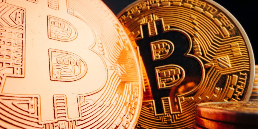 Close up photo of bitcoin crypto currency in dark